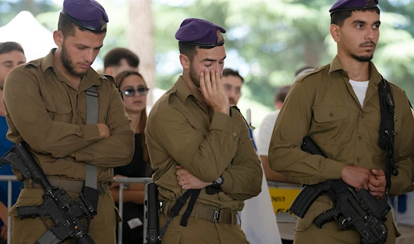 Israeli soldiers from the Givati Brigade attend the funeral for Sgt. Yonatan Elias, who was killed in action in the Gaza Strip, at Mount Herzl military cemetery in his hometown of occupied al-Quds, on May 31, 2024. (AP)