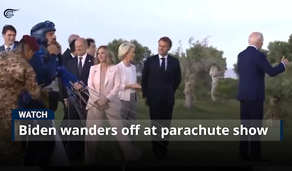 Biden wanders off at parachute show