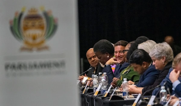 Democratic Alliance leader John Steenhuisen smiles at the end of the swearing in ceremony for members of parliament Cape Town, South Africa, Friday, June 14, 2024. (AP)