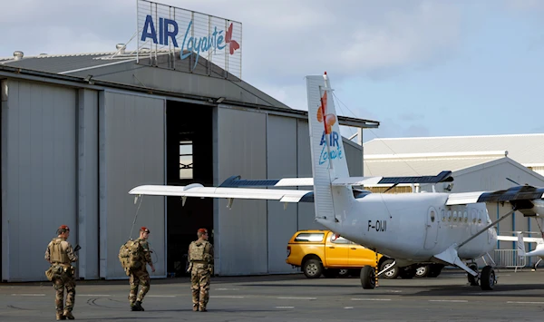 French authorities reopen New Caledonia's airport, ease restrictions