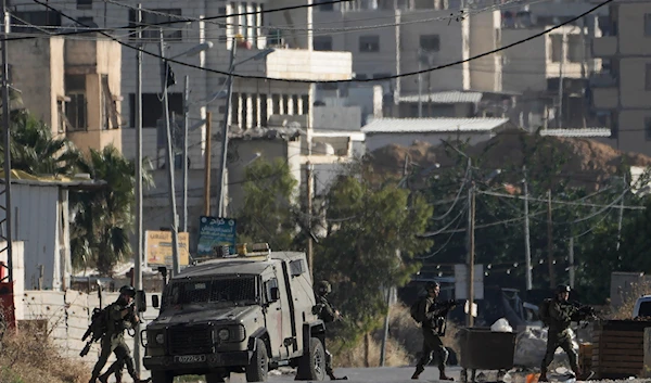 Israeli forces operate in the Balata refugee camp, in the West Bank city of Nablus, on June 1, 2024. (AP)