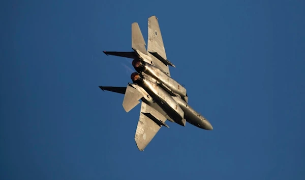 An IOF air force F-15 fly in the air in Hatzerim air force base, near the Gaza Strip, occupied Palestine, Thursday, June 24, 2021. (AP)