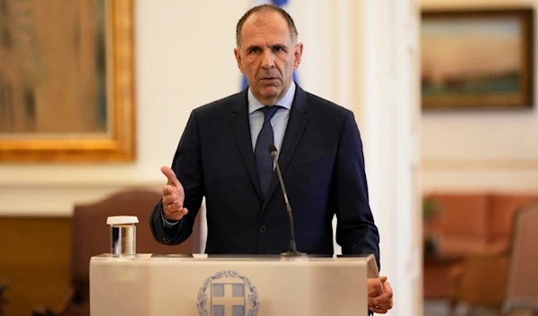 George Gerapetritis, 56, the new Greek Foreign Minister makes statements during a handover ceremony, in Athens, Greece, on Tuesday, June 27, 2023 (AP)