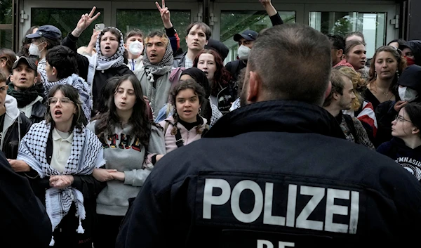 GermanyParticipants face German police officers during a pro-Palestinians demonstration by the group "Student Coalition Berlin" in Freie Universität Berlin in Germany, May 7, 2024. (AP)