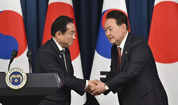 Japan, South Korea agree to resume defense exchanges