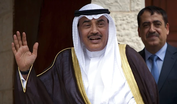 Kuwaiti then-Foreign Minister, now Crown Prince, Sheikh Sabah Khaled Al Hamad Al Sabah waves as he arrives in the West Bank city of Ramallah, occupied Palestine, Sept. 14, 2014. (AP)