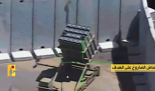 A screengrab from a video posted by the Islamic Resistance in Lebanon depicting the moment an Iron Dome missile launching platform was hit with an Almas Missile (Military Media of the Islamic Resistance in Lebanon)