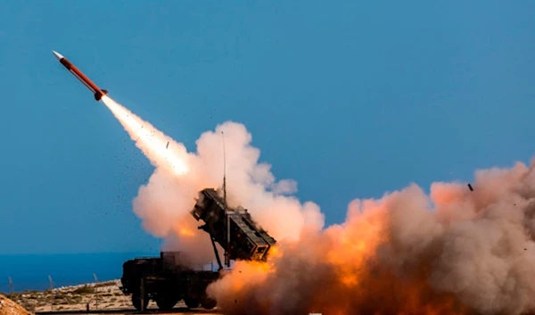 German soldiers assigned to Surface Air and Missile Defense Wing 1, fire the Patriot weapons system at the NATO Missile Firing Installation, in Chania, Greece, on Nov. 8, 2017. (AP)