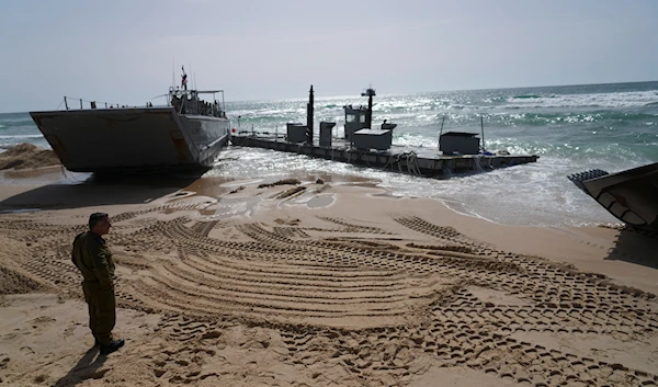 A US Army landing craft is seen beached in Ashdod, May 26, 2024, after being swept by wind and current from the temporary humanitarian pier in the Gaza Strip (AP)