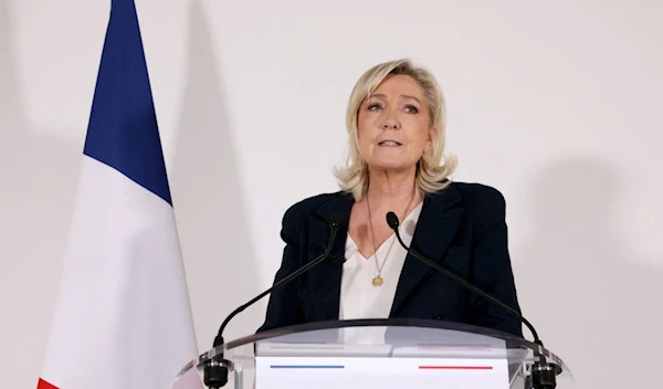 Marie Le Pen addresses her New Year wishes to the press during a news conference on January 25, 2024. (AFP)