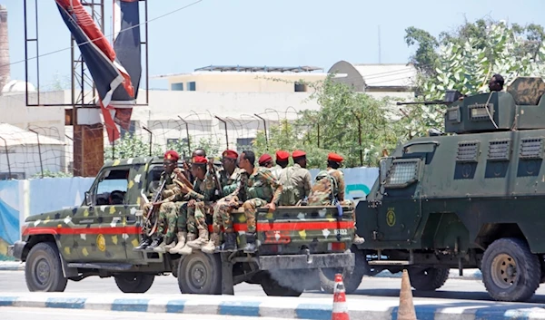 Somalia security officers patrol near the SYL hotel building which was attacked on Thursday by al-Shabab Islamic extremist rebels in Mogadishu, Somalia, Friday March 15, 2024. (AP)