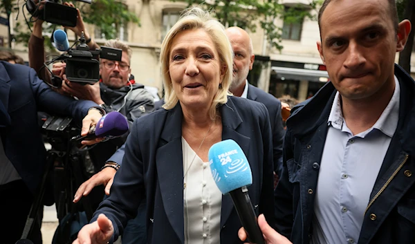 French far-right leader Marine Le Pen arrives at the National Rally party headquarters, Monday, June 10, 2024 in Paris. (AP)