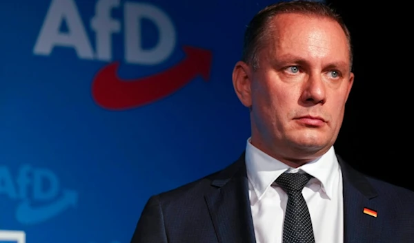 Afd's top candidate Tino Chrupalla follows the first forecasts on the outcome of the election at the Alternative for Germany party, AfD, election event in Berlin, Sunday, Sept. 26, 2021. (AP)