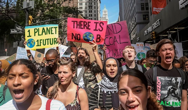 Climate change activists participate in an environmental demonstration as part of a global youth-led day of action, September 20, 2019. (AP)