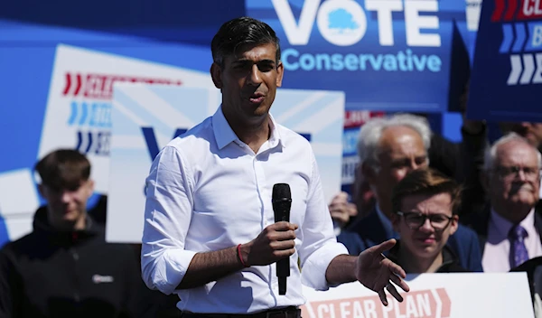 Britain's Prime Minister Rishi Sunak launches the Conservative campaign bus during a speech Saturday, June 01, 2024. (AP)