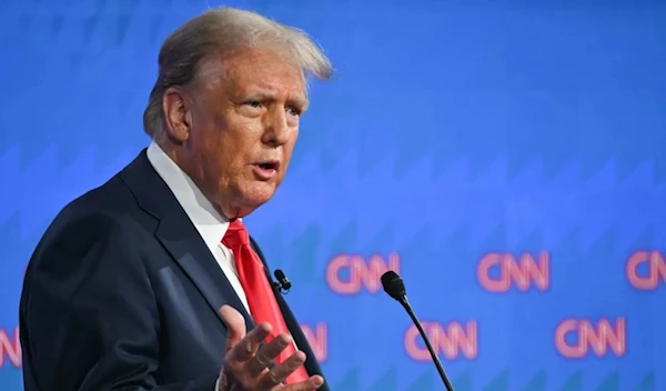 Former US President and Republican presidential candidate Donald Trump speaks as he participates in the first presidential debate of the 2024 elections with US President Joe Biden at CNN’s studios in Atlanta, Georgia, June 27, 2024. (AFP)