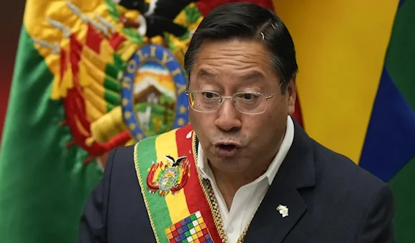 Bolivia’s President Luis Acre addresses the nation at the presidential palace in La Paz, on January 22,2022. (AP)