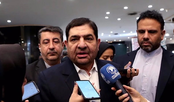 Iran's interim president Mohammad Mokhber talks to reporters on the sidelines of visit to a polling station in Tehran on June 28, 2024. (Photo by IRNA)