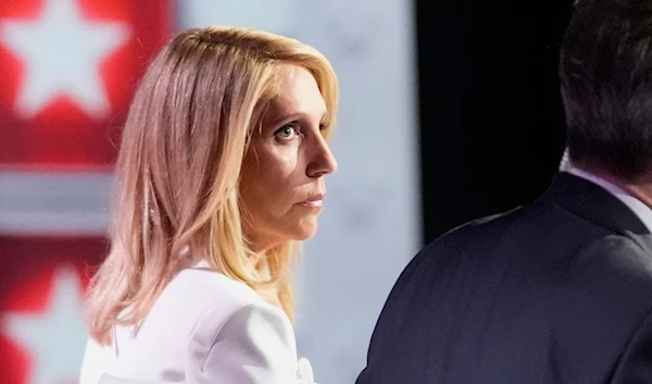 CNN's Dana Bash listens as she and Jake Tapper moderate the debate between President Joe Biden and Republican presidential candidate Donald Trump, Thursday, June 27, 2024, in Atlanta. (AP)