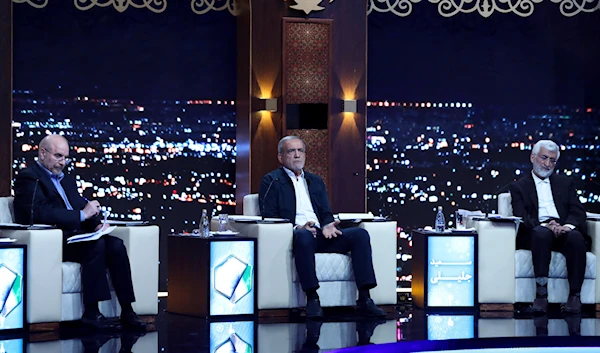 In this picture made available by Iranian state-run TV, IRIB, shows presidential candidates Masoud Pezeshkian, center, Mohammad Bagher Qalibaf, left, and Saeed Jalili in Tehran, Iran, June 17, 2024 (AP)