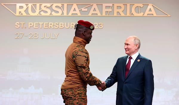 Burkina Faso's Capt. Ibrahim Traore and Russian President Vladimir Putin before an official ceremony at the Russia Africa Summit in St. Petersburg, Russia, Thursday, July 27, 2023. (AP)