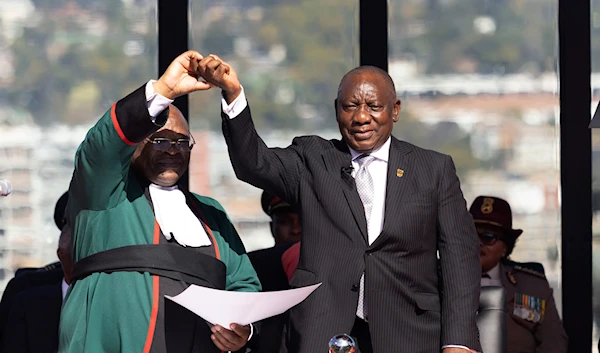 Ramaphosa announces new South African gov. with long-term rivals