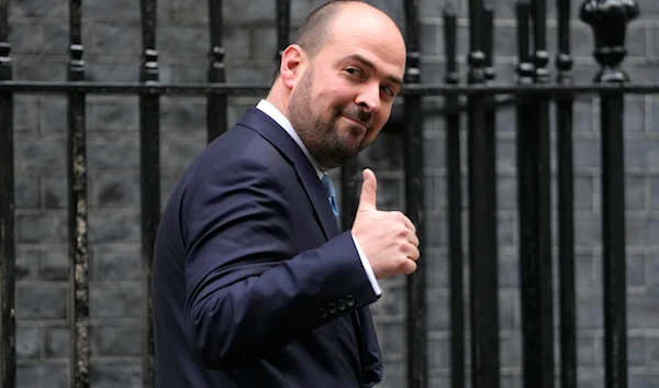 Richard Holden leaves Downing Street after he is appointed to replace Greg Hands as Tory party chair, in London, Monday, Nov. 13, 2023. (AP)