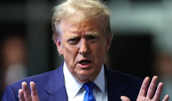 Republican presidential candidate and former US president Donald Trump speaks to reporters at the end of the day's proceedings in his criminal trial at the New York State Supreme Court in New York City, on May 3, 2024. (AFP)