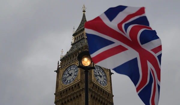 A Union flag is displayed outside the Houses of Parliament, in London, Thursday, May 23, 2024. (AP)