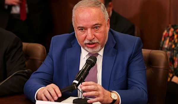 Avigdor Lieberman speaks at the weekly cabinet meeting, at the Prime Minister's office in occupied al-Quds, Sunday, Feb. 13, 2022 (AP)