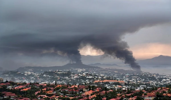 Smoke rises during protests in Noumea, New Caledonia, Wednesday May 15, 2024. (AP)