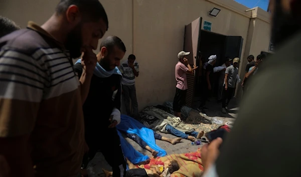 Palestinian children killed in the Israeli bombardment of the Gaza Strip are brought to al-Aqsa Hospital in Deir al-Balah, central Gaza Strip, Saturday, June 8, 2024 (AP Photo/Ismael Abu Dayyah)