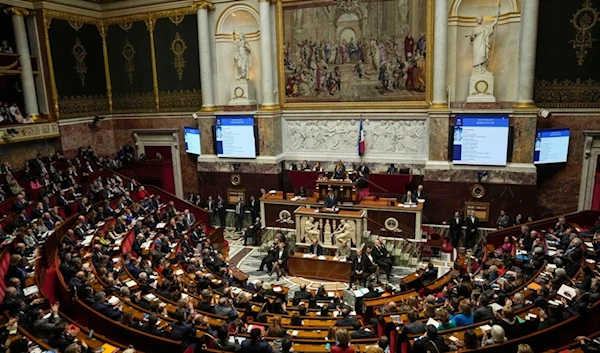 Lawmakers gather at the National Assembly, Tuesday, Jan. 30, 2024 in Paris. (AP)