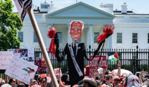 Pro-Palestinian demonstrators rally outside the White House in Washington, D.C., on Saturday to protest against Israeli genocide in Gaza. (AFP / Getty Images)