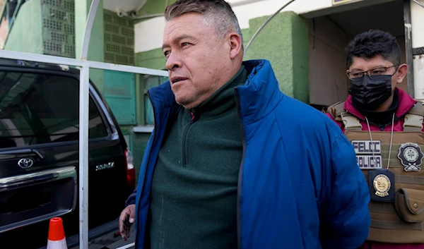 Juan Jose Zuniga, former commanding general of the army, is escorted from a jail to be taken to Chonchocoro maximum security prison, in La Paz, Bolivia, June 29, 2024 (AP)