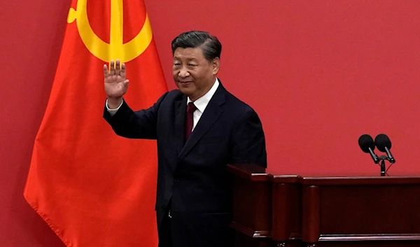 Chinese President Xi Jinping gestures at a 2022 event to introduce new members of the Politburo Standing Committee at the Great Hall of the People in Beijing. undated. (AP)