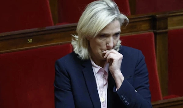 Marine Le Pen attends a debate on France’s sovereignty, nationality, immigration and asylum called by the right-wing party Les Republicans at the National Assembly in Paris, on December 7, 2023. (AFP)