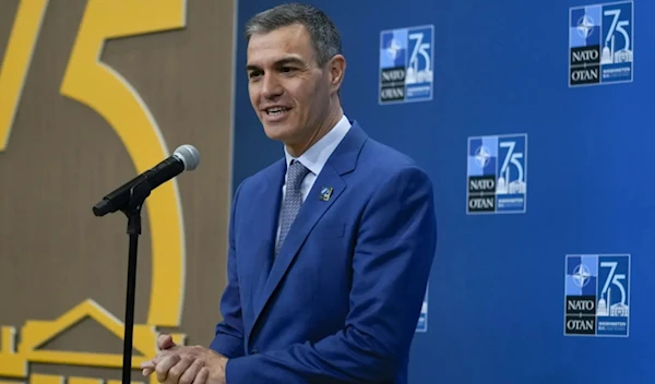 Spain’s prime minister Pedro Sanchez speaks during his arrival at the Nato summit in Washington on July 11,202 (AP)