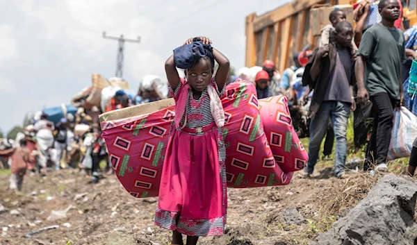 Thousands fleeing the continuing conflict between government forces and M23 rebels have sought shelter in the city of Goma (AP)