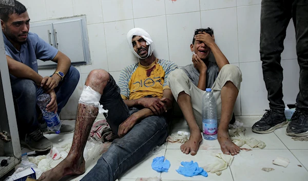 Palestinians wounded in the Israeli bombardment of the Gaza Strip are brought to a hospital in Khan Younis, the Gaza Strip, occupied Palestine, July 9, 2024 (AP)