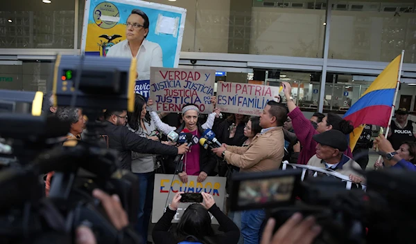 Alexandra Villavicencio, sister of slain presidential candidate Fernando Villavicencio, gives statements to the press after the reading of the sentence of those charged with the murder of Villavicencio, in Quito, Ecuador, July 12, 2024 (AP)