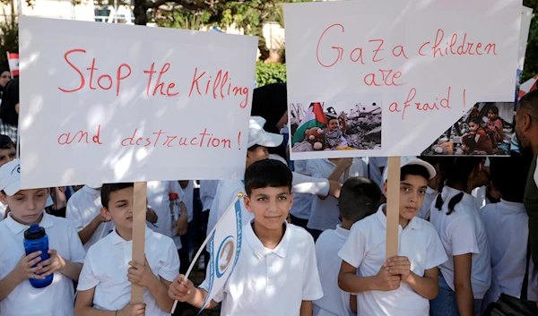 Students of Dar Al Aytam Al Islamiya protest to show support for Palestinians in the Gaza Strip, in front of the headquarters of U.N. ESCWA in Beirut, Lebanon, Tuesday, June 11, 2024. (AP)