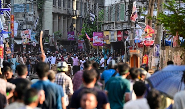 Anti-quota protesters and students backing the ruling Awami League party clash in Dhaka on July 16, 2024. (AFP)