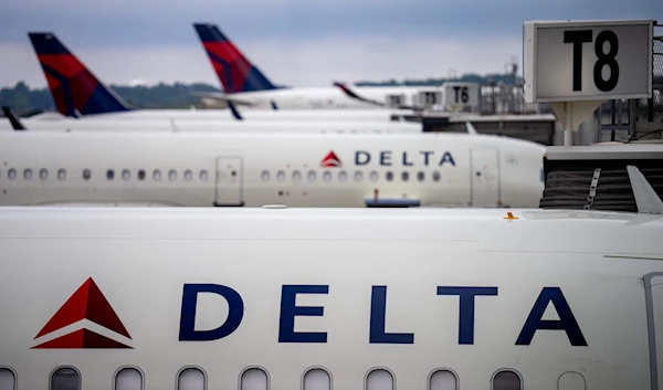 Delta Airlines planes sit parked at Hartsfield-Jackson Atlanta International Airport in Atlanta, Georgia, June 28, 2024. (AFP)