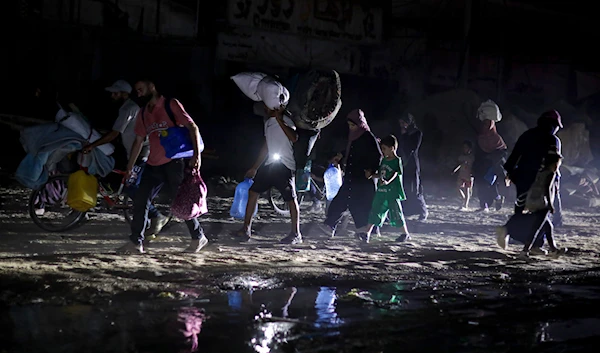 Palestinians displaced by the Israeli air and ground offensive on the Gaza Strip flee from parts of Khan Younis following an evacuation order by the Israeli army to leave the eastern part of Gaza Strip's second largest city on July 1, 2024. (AP)