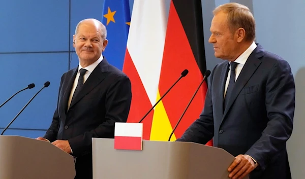 German Chancellor Olaf Scholz, left, and Polish Prime Minister Donald Tusk attend a press conference after German-Polish inter-governmental consultations in Warsaw, Poland, Tuesday, July 2, 2024. (AP)