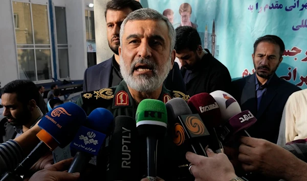 Revolution Guard aerospace division commander Gen. Amir Ali Hajizadeh speaks with media members as he arrives at a ceremony in Tehran, Iran, Monday, Nov. 13, 2023. (AP)