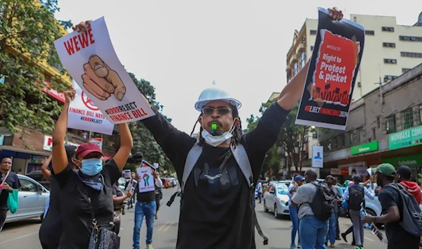 Demonstrators protest against Kenya's controversial finance bill in Nairobi on June 18, 2024. (AP)