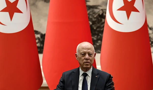 Tunisian President Kais Saied attends a signing ceremony with Chinese President Xi Jinping at the Great Hall of the People in Beijing, on May 31, 2024. (AP)