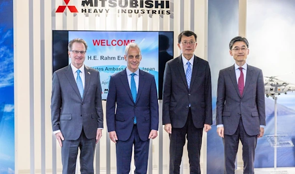 US Ambassador to Japan, Rahm Emanuel, poses with the officials of Mitsubishi Heavy Industries (MHI) and Lockheed in the town of Toyoyama in the Aichi prefecture, Japan, April 16, 2024.(US Embassy/AP)